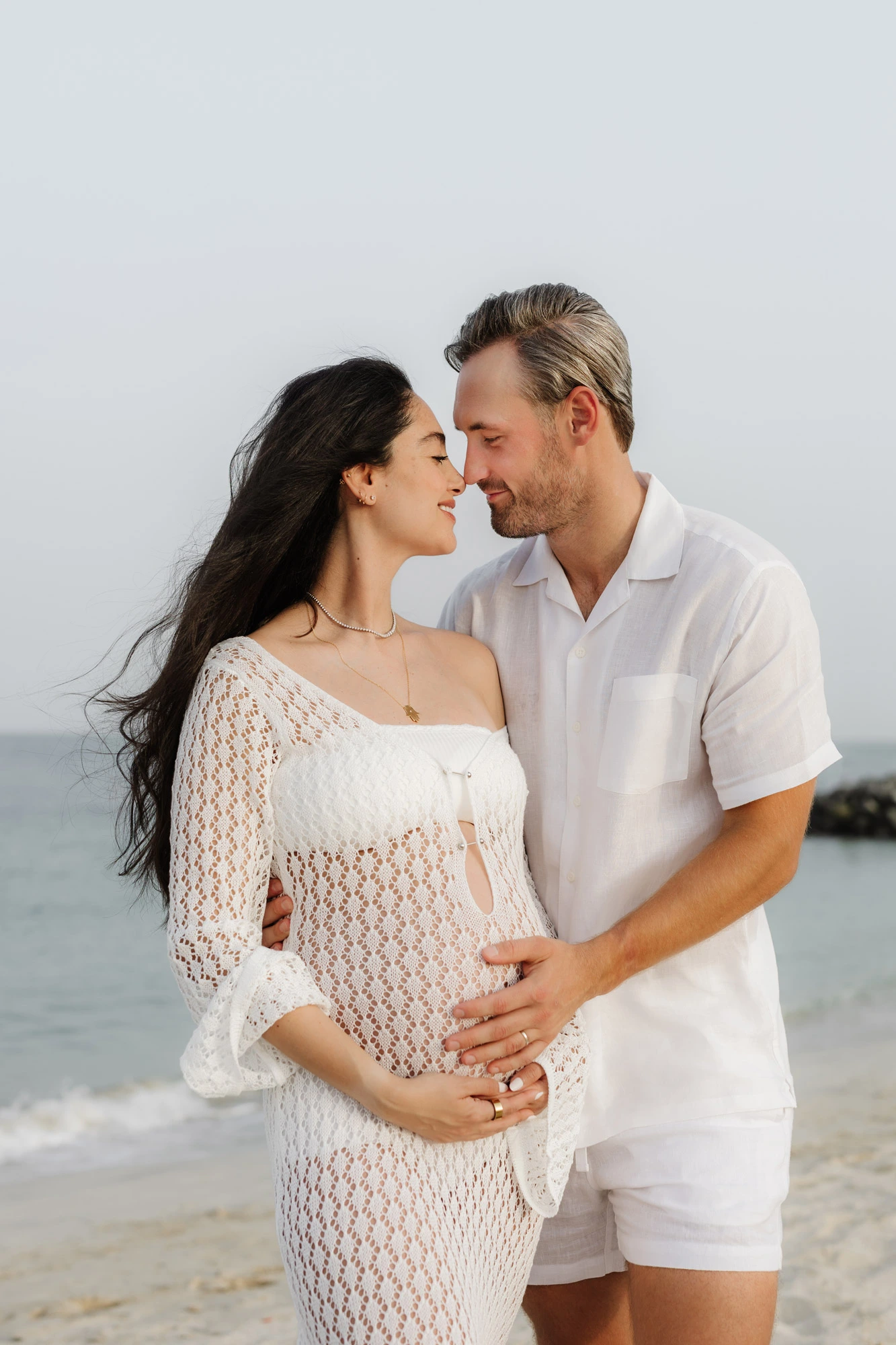 Dubai Family Photographer Beach Motherhood Embrace Sea Breeze