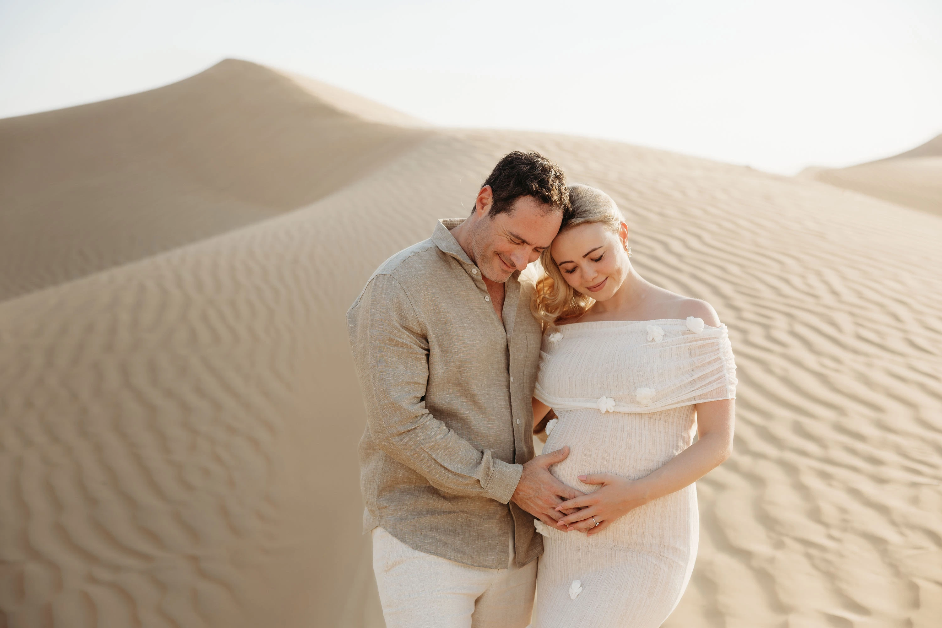 Dubai Family Photographer Desert Holding Hands Golden Dunes
